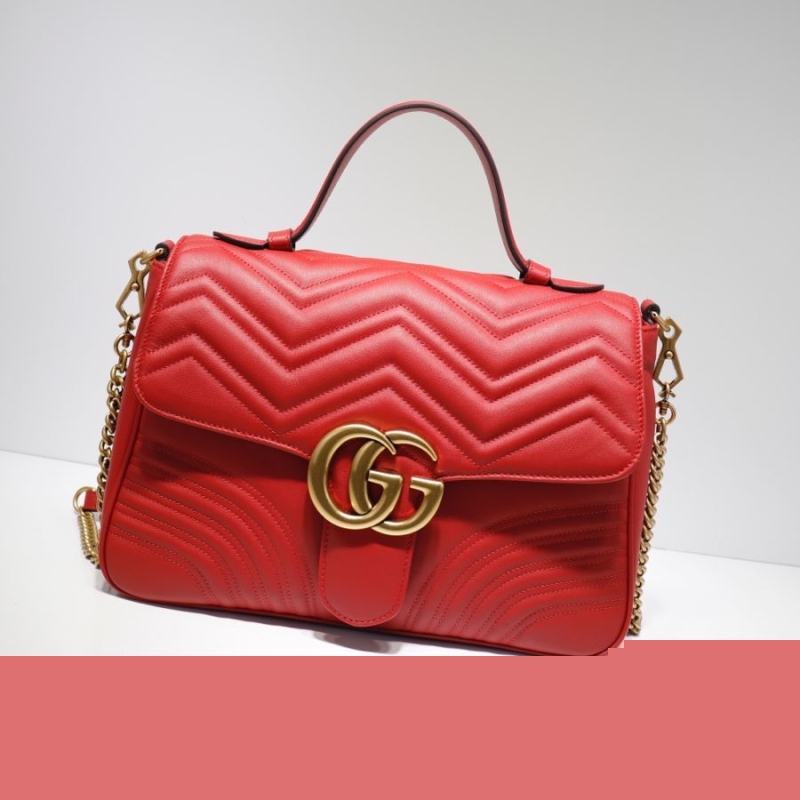 G*u*i top handle bags